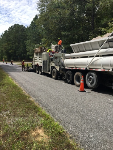 Microsurfacing Continues This Week on Castaway Island, Little Kowaliga Roads in Elmore County