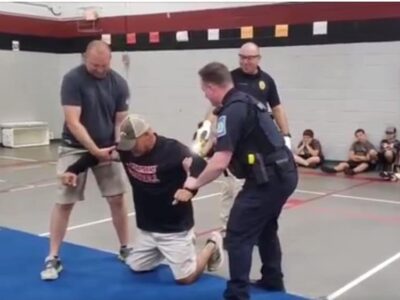 SEHS Principal Fuller ‘Rides the Lightning’ During Taser Demonstration for Junior Police Academy