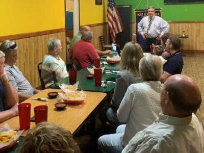 State Health Officer Pays Visit to Lions Club Meeting; Art Faulkner Presented with Award