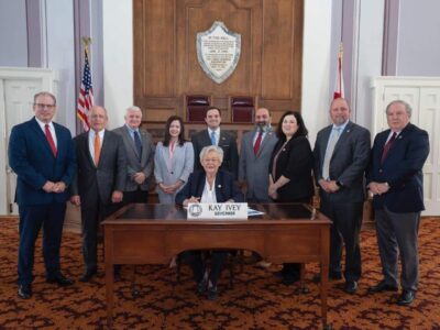 Autauga and Elmore County EMA Directors attend Governor Ivey signing HB3 into state law