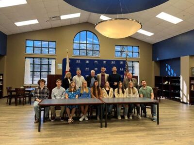 Pine Level Mayor presents award to Marbury High School government class for participation in Pine Level history 