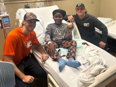Home runs of hope and swinging for smiles at Baptist Hospital 