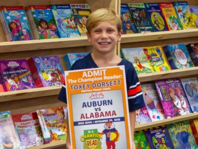 Prattville Primary student gets Iron Bowl tickets for winning AEA’s 𝐵𝑒 𝐴 𝐶ℎ𝑎𝑚𝑝𝑖𝑜𝑛 𝑎𝑛𝑑 𝑅𝑒𝑎𝑑 contest 